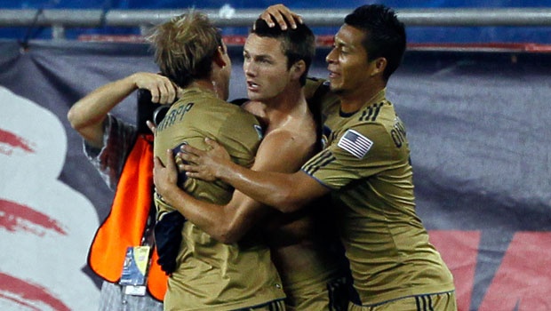 Union Jack celebrates a goal vs. New England