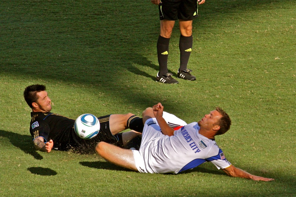Danny Califf goes in with a heavy slide tackle
