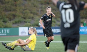 Christine Sinclair points to Marta after scoring as Independence fall to FC Gold Pride in 2010 WPS Championship