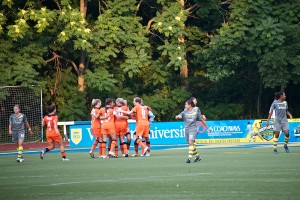 NJ gets on the board with an own goal.