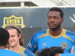 Reading United's Greg Cochrane and former QPR man Patrick Kanyuka