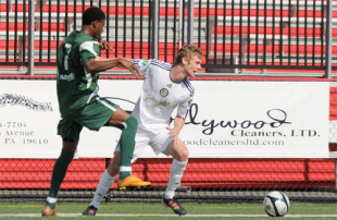 Reading United upset by Jersey, 2-0