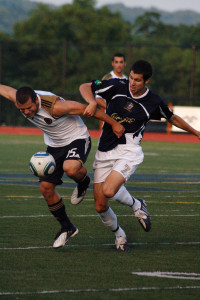 Matt Hedges battles Alejandro Moreno for possession in the inaugural friendly in 2010. (Photo Credit: Rachel Boscov)
